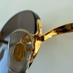 Cartier | Accessories | Cartier Oval Rimless Sunglasses  display picture 1
